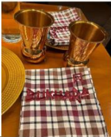 BUKHARA logo on the dining table inside the restaurant 