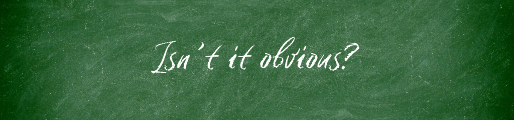 Image of a green board with the text "Isn't it obvious?" written in Chalk
