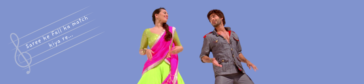 Cartoon-style image inspired by the Bollywood song "Saree Ke Fall Sa," featuring a woman (Sonakshi Sinha) in a neon green and pink saree and a man (Shahid Kapoor) in a grey outfit dancing against a blue background. Both are mid-step, with expressive hand gestures. Musical notes on the left include the text “Saree ke Fall ka match kiya re...”