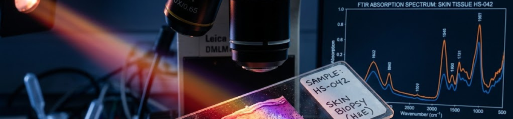 FTIR microspectroscopy setup showing a skin biopsy sample on a microscope slide illuminated by an infrared beam, with an FTIR absorption spectrum displayed in the background, representing the in vitro spectral analysis method at the centre of the Delhi High Court's Section 3(i) diagnostic methods decision in Natalja Eikje v. Joint Controller of Patents and Designs.