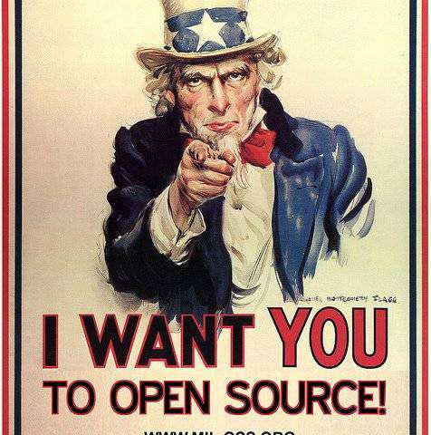 The image depicts a man pointing with the words 'I want you to open source' written at the bottom as the post is about open source software