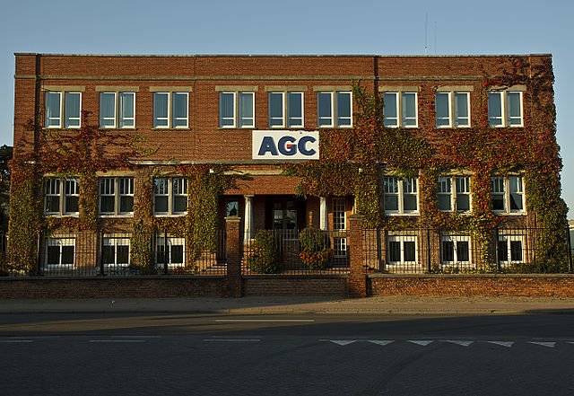 The image depicts the main building of AGC situated in Netherlands.