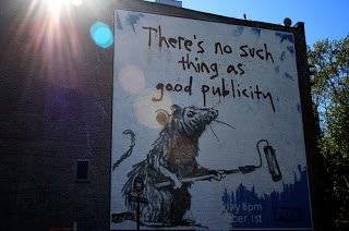 The image shows a graffiti stating "There is no such thing as good publicity". The post is about publicity wars. Click on image to view post.