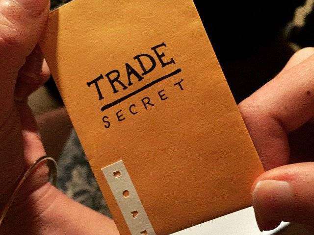 The image depicts the text 'Trade Secret' on a piece of paper. The post is about a trade secret misappropriation case. to read more click here.