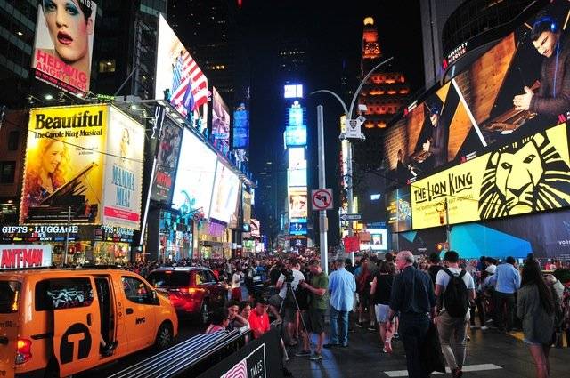 The image depicts a display of ads in New York
