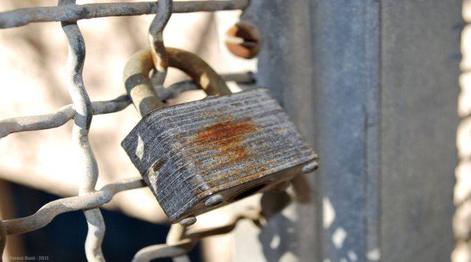 This image depicts a rusted lock on a gate. This image is relevant because this post talks about the ongoing debate about the Trade Secret law in India. Click on the image to view full post