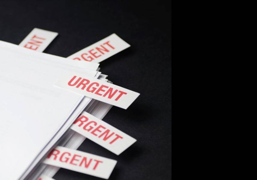 This image depicts Paper Tags having Urgent written on it. This image is relevant as the issue here is whether a request for prioritized examination be given more priority. Click on the image for more information
