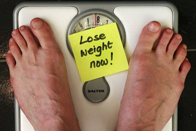 The image is of a weighing machine with help written where the weight is displayed. The post is about weight loss patents.To read more click here