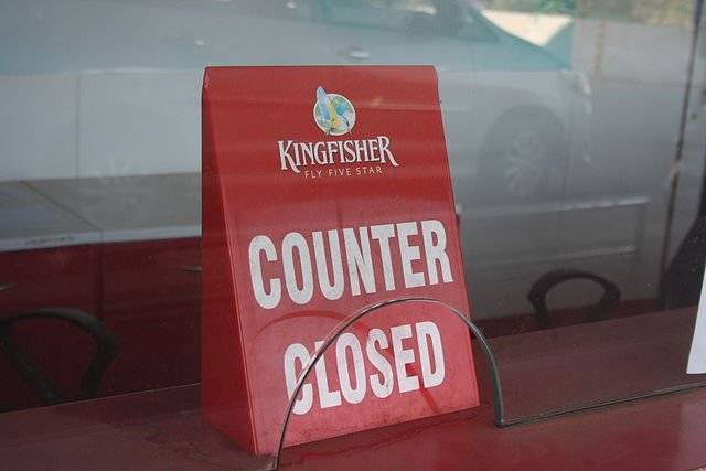 The image is of a placard on a Kingfisher airlines ticket counter which says 'counter closed' as the post is about the kingfisher trademarks. To read more click here.