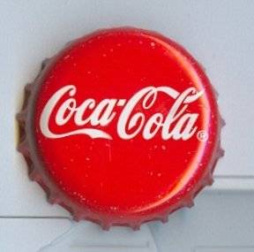 The featured image shows the top view of the cap of a coca cola bottle. The post is about the registration of "zero" as a trademark by Coca Cola. To know more, please click here.