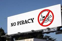 The featured image shows a signboard with the words 'No Piracy' written in black , bold letters. A skull with two cross bones is also present next to the words. The post is about a john doe order that YRF secured in its favour regarding the movie 'sultan'. To know more, please click here.