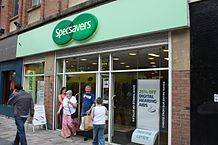 The featured image shows a showroom of Specsavers. The post is about a recent trademark approval by Specsavers. To know more, please click here.