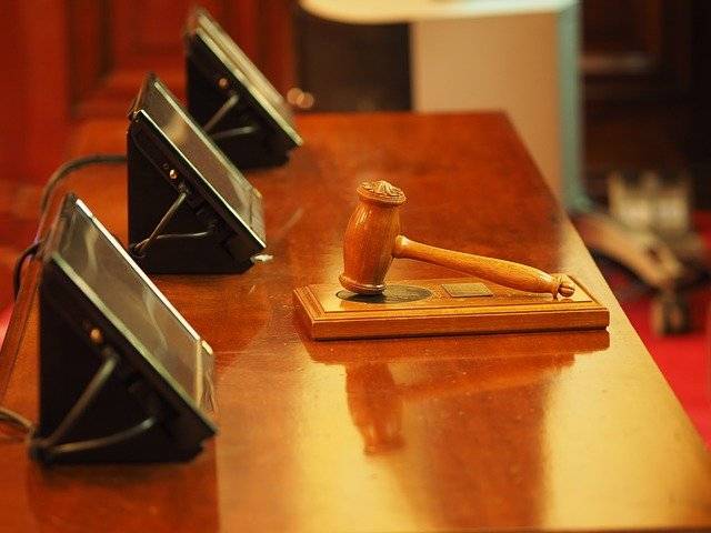 The featured image shows the hammer and gavel used in court proceedings. This image has been used to represent the mock opposition proceeding.